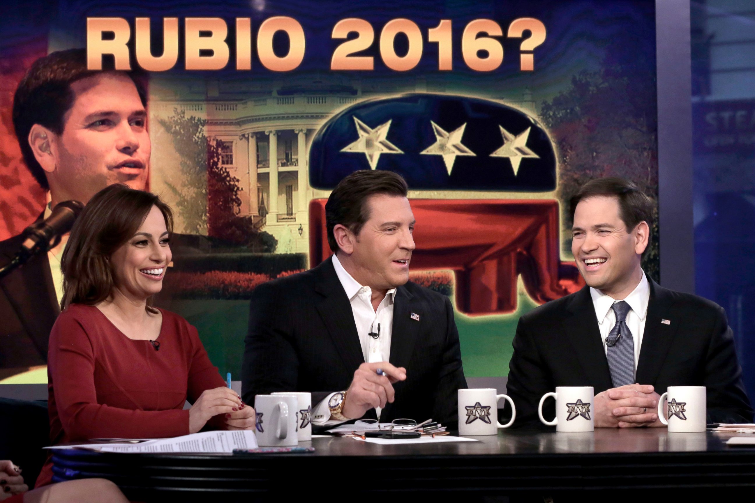 PHOTO: Co-hosts Julie Roginsky, and Eric Bolling, center, interview U.S. Sen. Marco Rubio, R-Fla., on "The Five" television program, on the Fox News Channel, in New York, March 30, 2015.