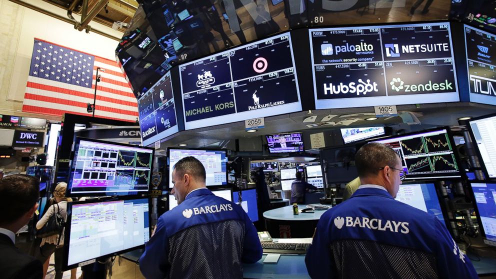 PHOTO: Traders with Barclays work at the New York Stock Exchange, July 6, 2015. World markets are trending downward following Greece's "no" vote in Sunday's debt referendum.