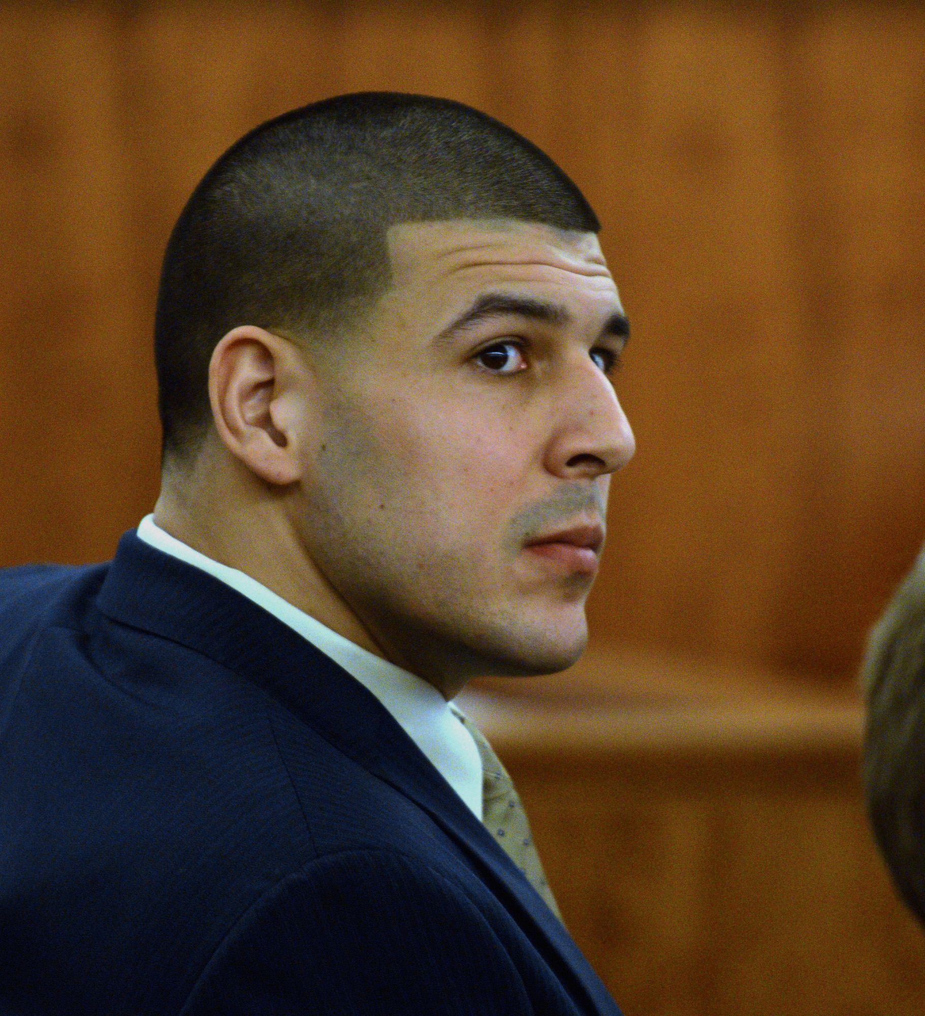 PHOTO: Former New England Patriots football player Aaron Hernandez listens during his murder trial, March 30, 2015, in Fall River, Mass.