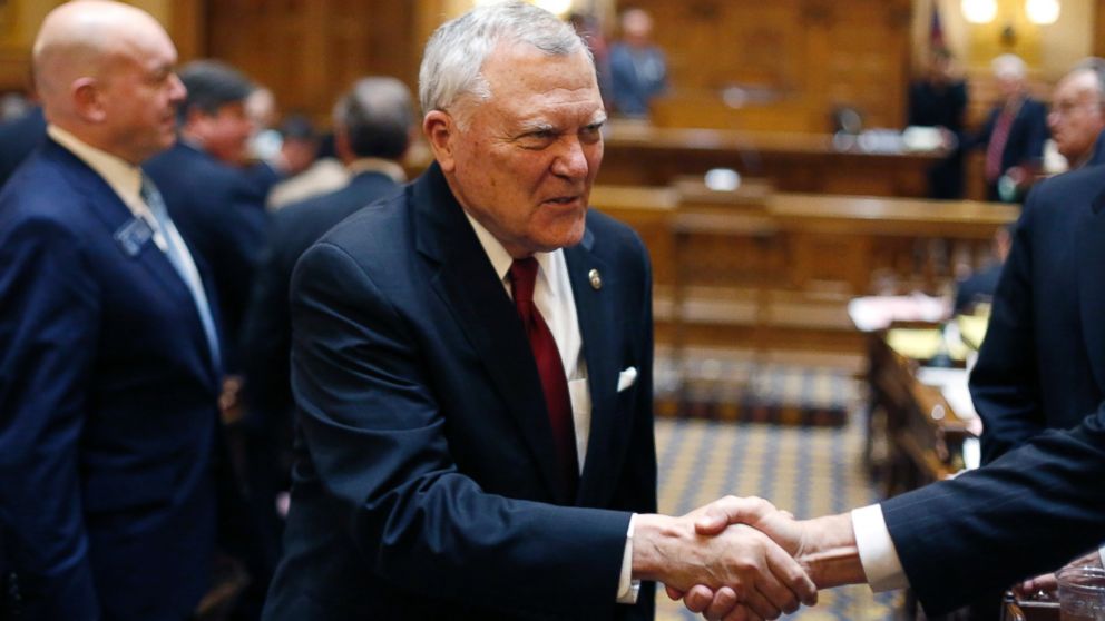 Georgia Gov. Nathan Deal greets senators after speaking in Senate chambers during the final day of the general assembly, March 24, 2016, at the Capitol in Atlanta.