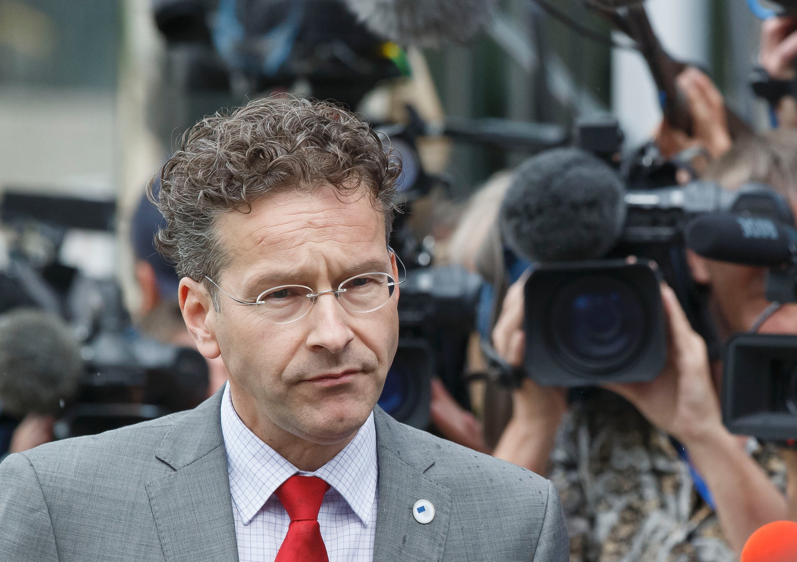 PHOTO: Dutch Finance Minister and chair of the eurogroup Jeroen Dijsselbloem, walks past the media after a meeting of eurozone finance ministers at the EU LEX building in Brussels, July 7, 2015.