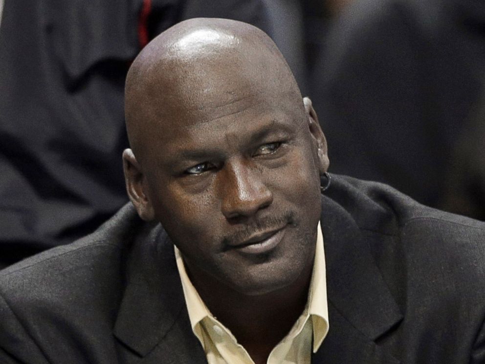 PHOTO:Michael Jordan watches an NBA basketball game in this undated file photo in Charlotte, N.C. 
