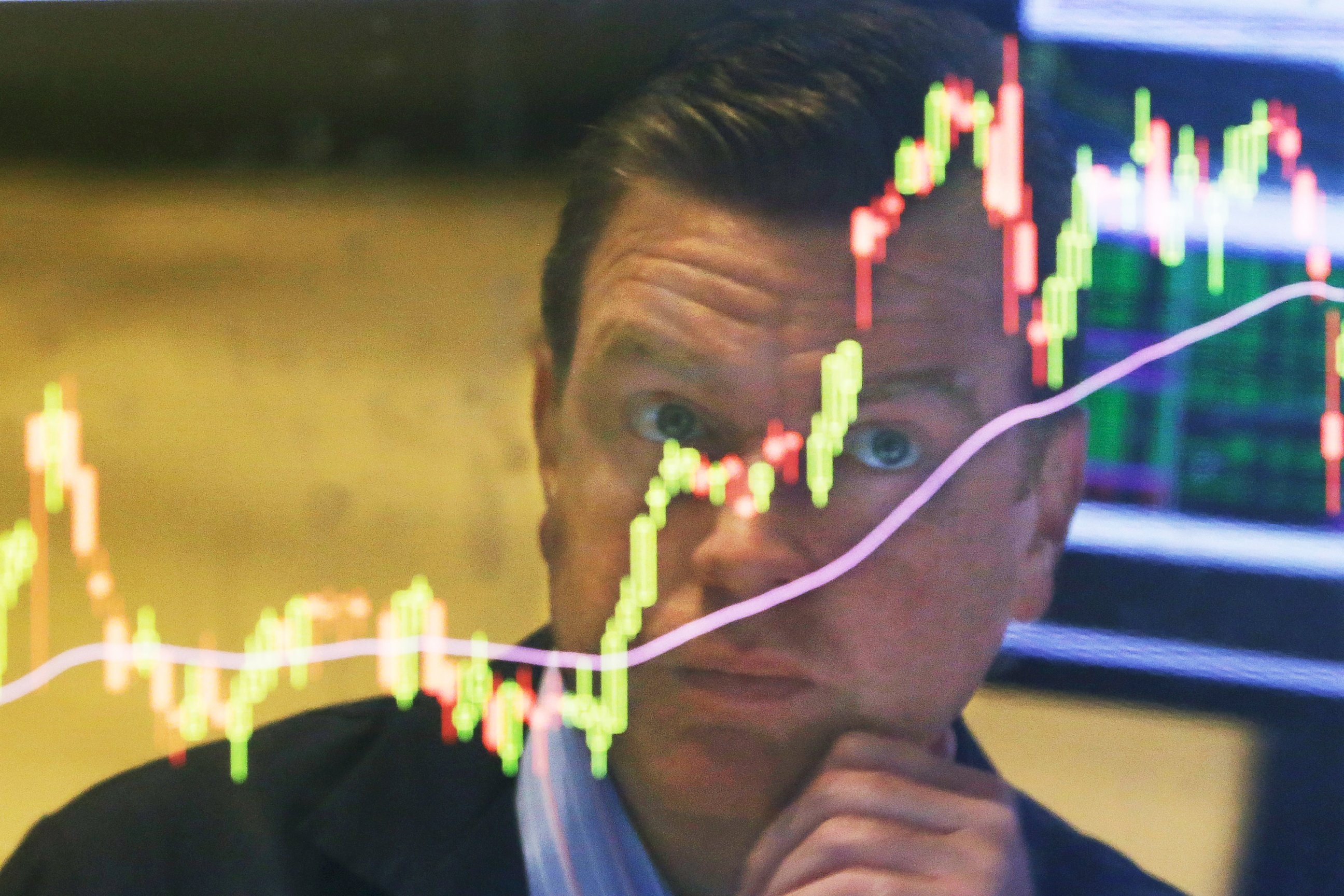 PHOTO:Specialist Michael O'Mara works on the floor, Aug. 25, 2015, of the New York Stock Exchange. 
