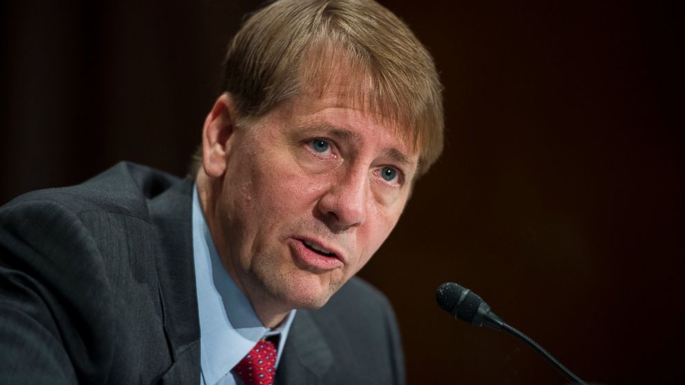 In this file photo, Consumer Financial Protection Bureau Director Richard Cordray testifies during the Senate Banking, Housing and Urban Affairs Committee hearing on the CFPB's semi-annual report to Congress, July 15, 2015.  