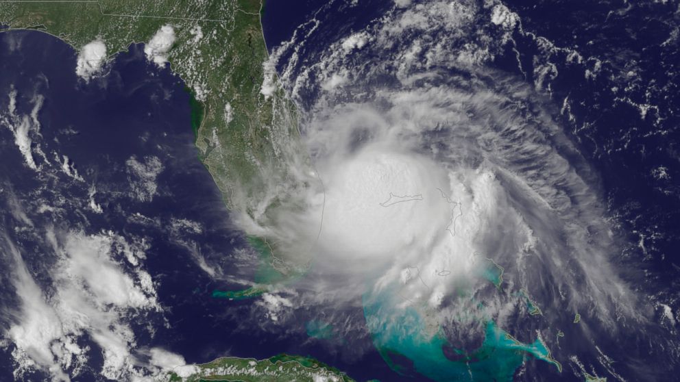 This satellite image released by the National Oceanic and Atmospheric Administration shows the center of Tropical Storm Arthur off the eastern coast of Florida, July 1, 2014. 