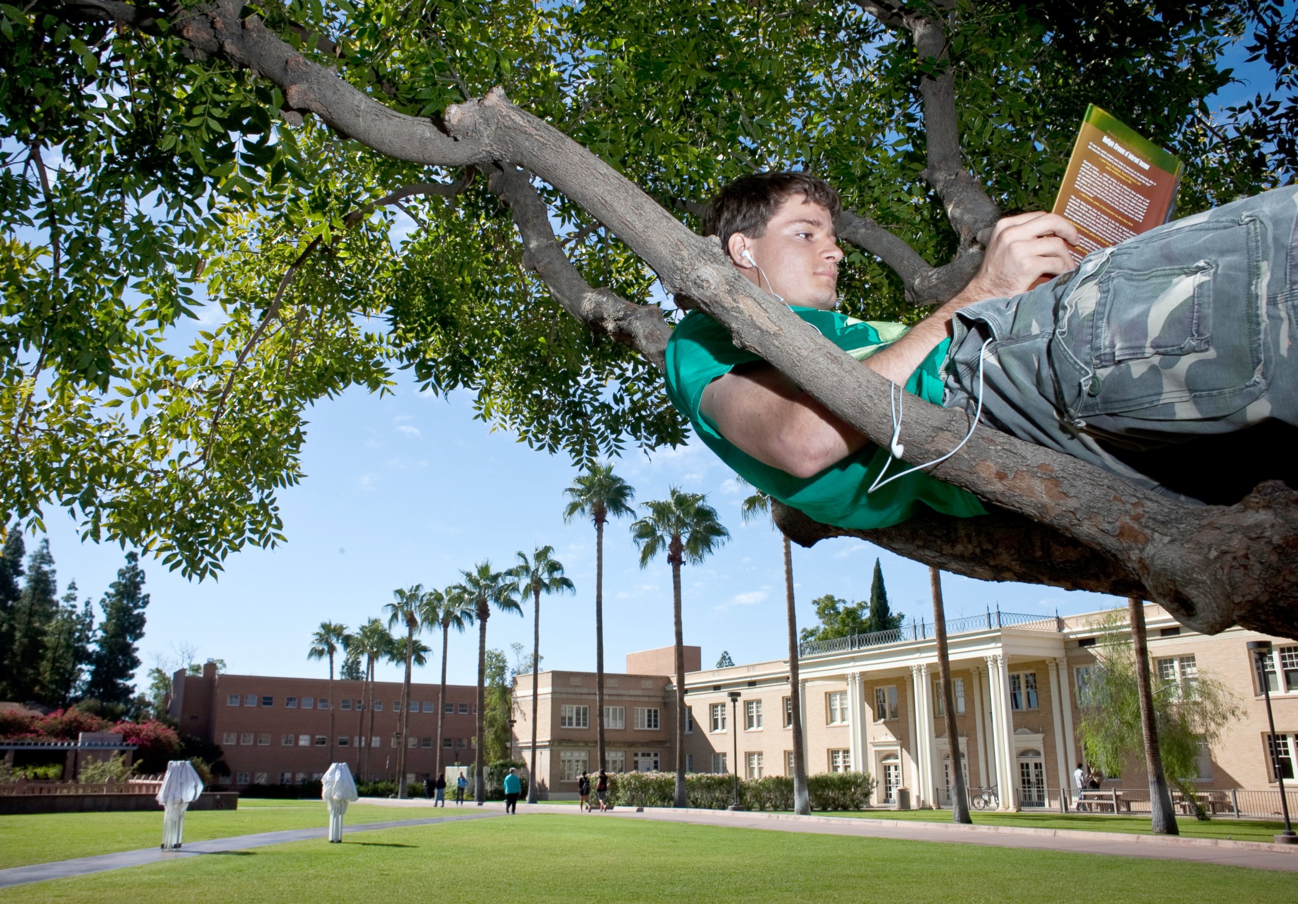 PHOTO: A mechanical engineering major reads between classes at Arizona State University, Oct. 27, 2010. 