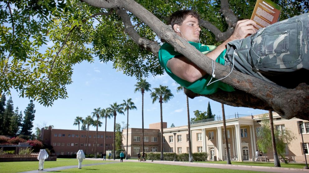 A mechanical engineering major reads between classes at Arizona State University, Oct. 27, 2010. 