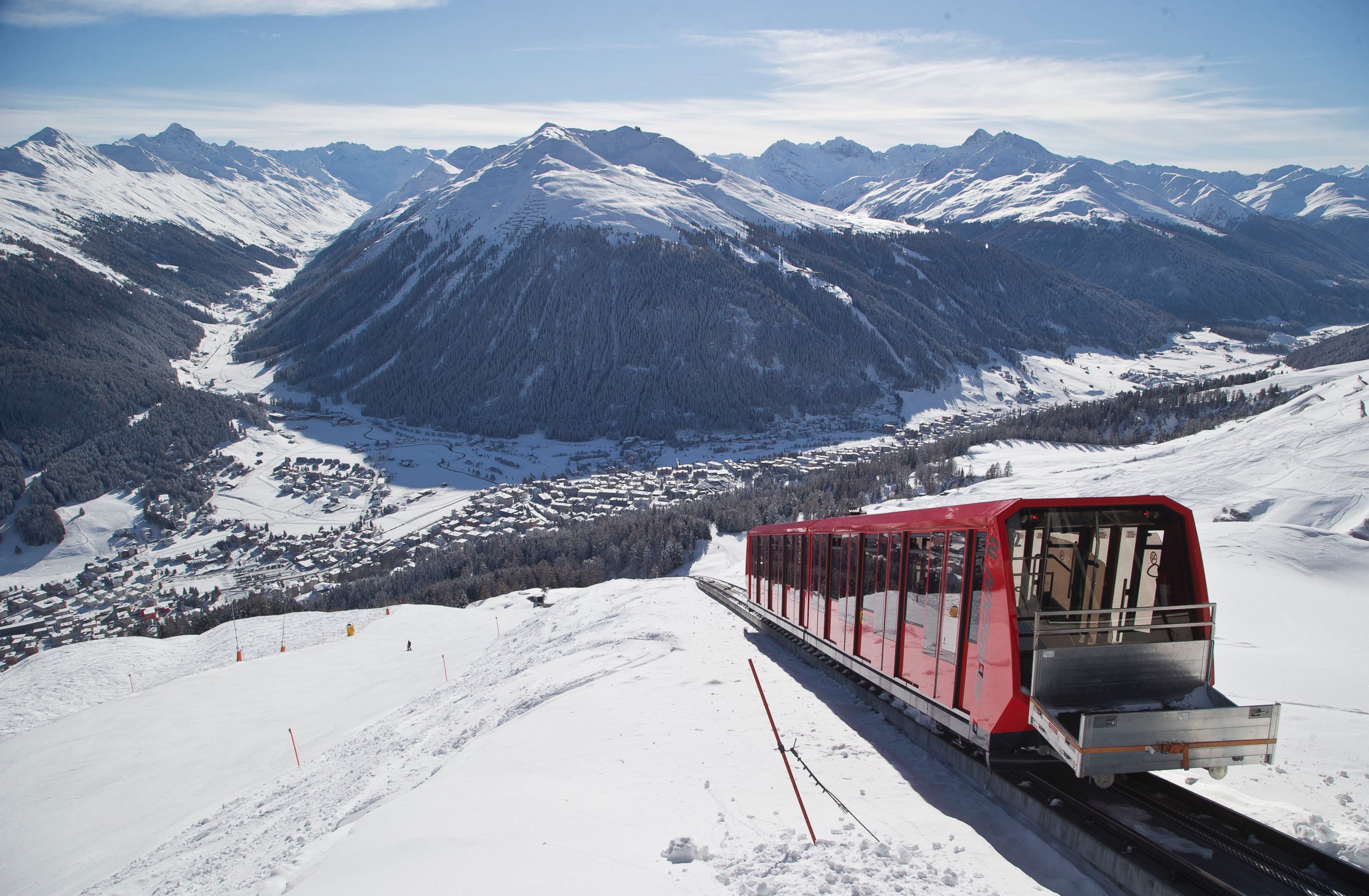 PHOTO: A cable train makes its way up the Weissfluhjoch mountain in Davos, Switzerland on Jan. 19, 2015. 