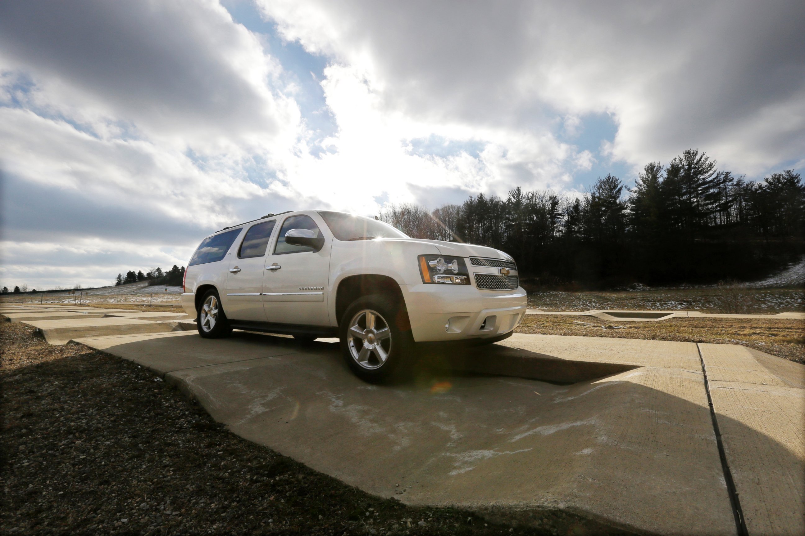 PHOTO: A Chevrolet Suburban is driven through the uneven terrain course at the General Motors Milford Proving Grounds in Milford, Mich., Jan. 17, 2013.