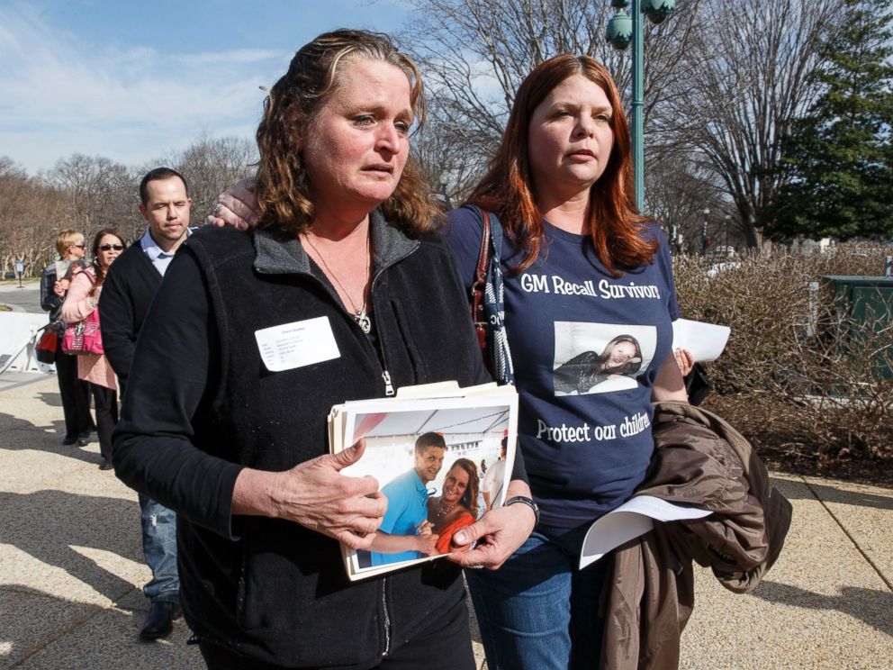 PHOTO: Cherie Sharkey, left, weeps for her son Michael Sharkey who died in his used 2006 Chevy Cobalt in Dresden, NY, as she walks with Laura Christian, of Harwood, Md., birth mother of Amber Marie Rose.
