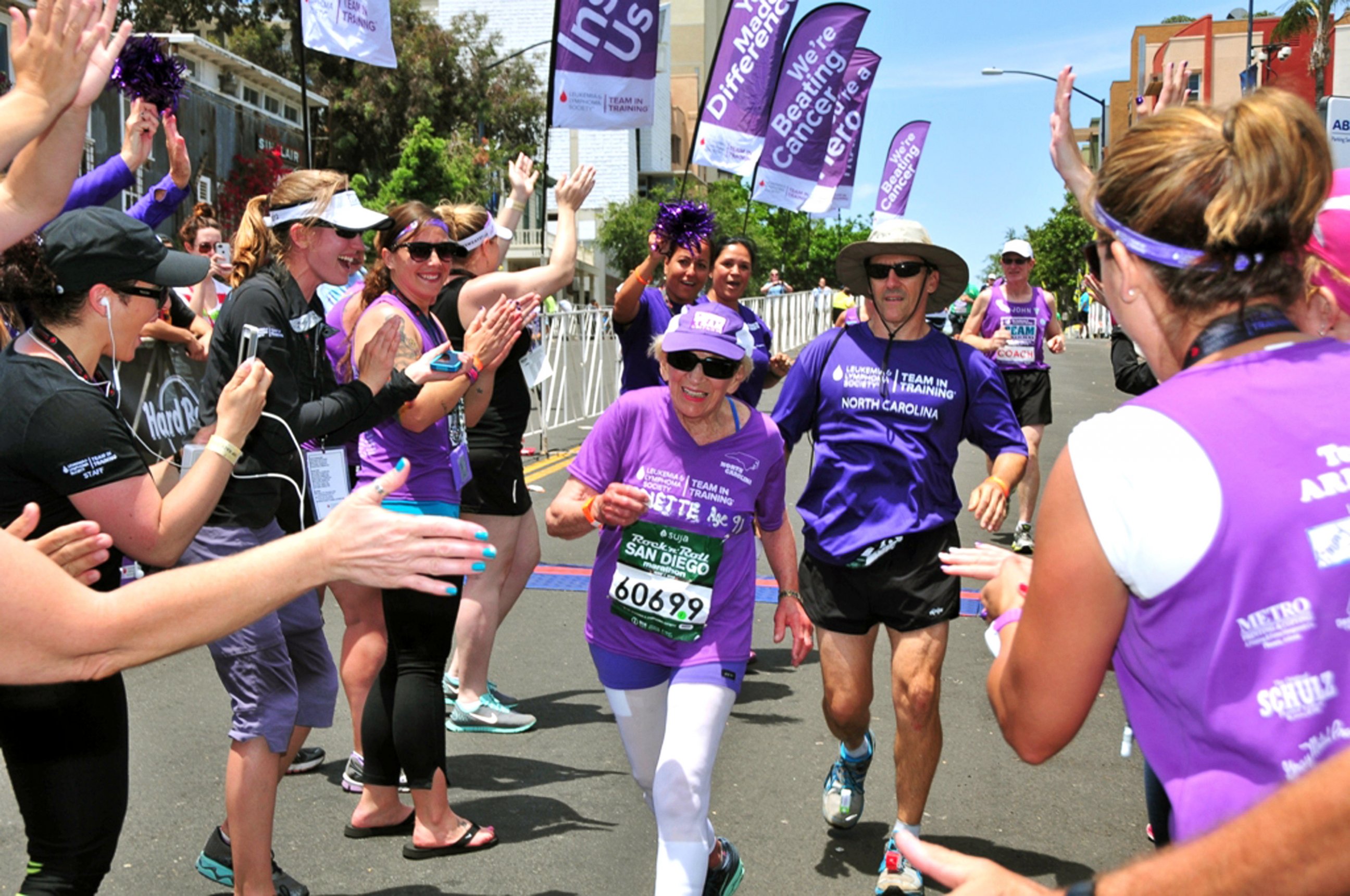PHOTO: Harriette Thompson crosses the finish line in the 2014 Suja Rock ?n? Roll Marathon
