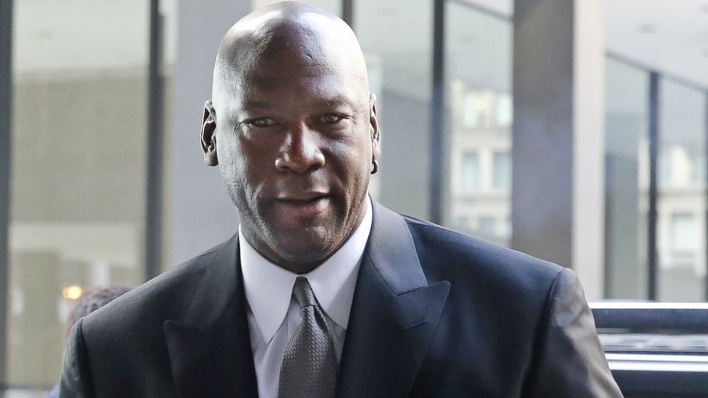 Basketball Hall of Famer Michael Jordan arrives at the federal courthouse, Aug. 18, 2015, in Chicago.