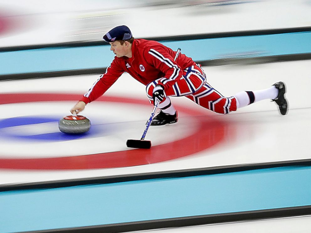PHOTO: Norways Christoffer Svae delivers the stone during the mens curling training session at the 2014 Winter Olympics, Feb. 9, 2014, in Sochi, Russia.