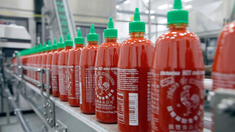PHOTO: Sriracha chili sauce is produced at the Huy Fong Foods factory in Irwindale, Calif. 
