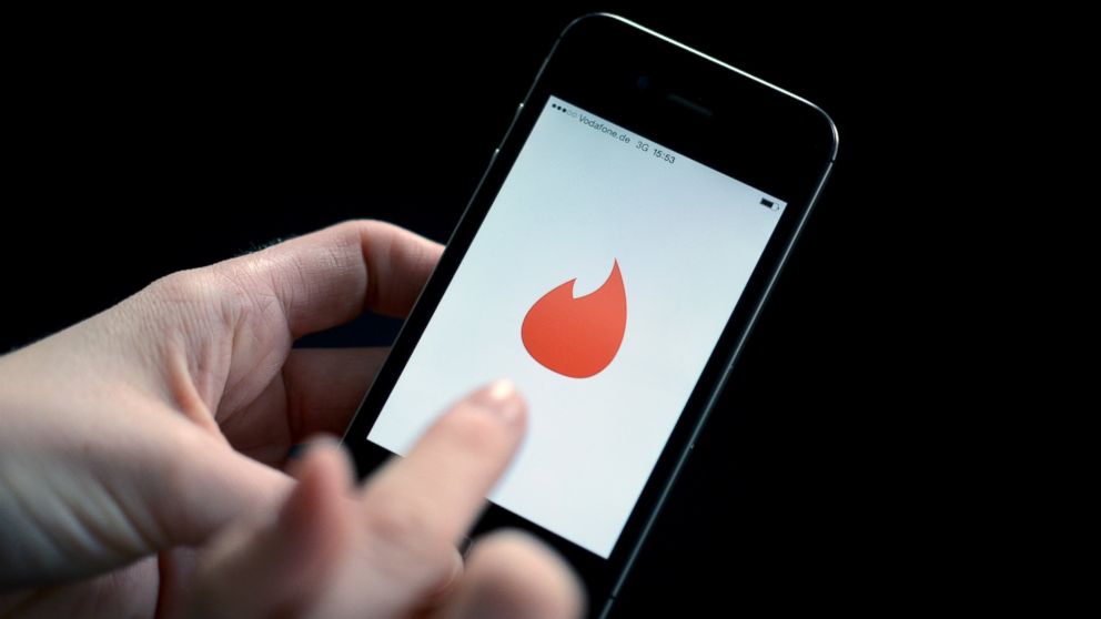 This photo illustration shows the dating application, Tinder.