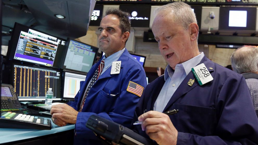 Traders work on the floor of the New York Stock Exchange, Aug. 28, 2015.