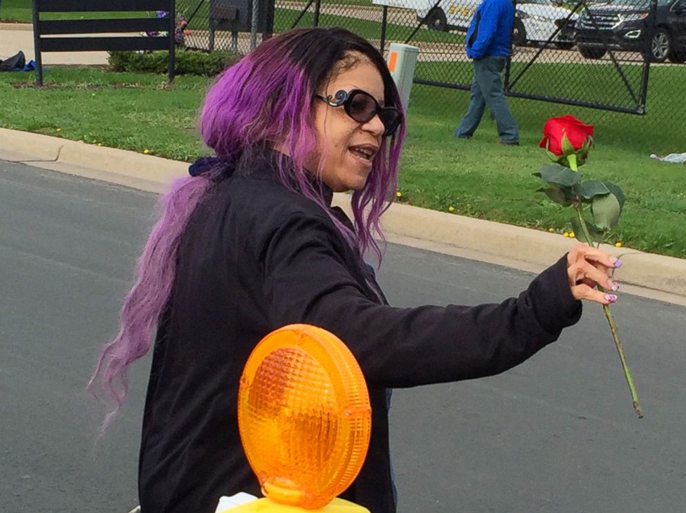 PHOTO:Tyka Nelson holds a rose outside Paisley Park, the home of her brother Prince in Chanhassen, Minn., April 21, 2016.   