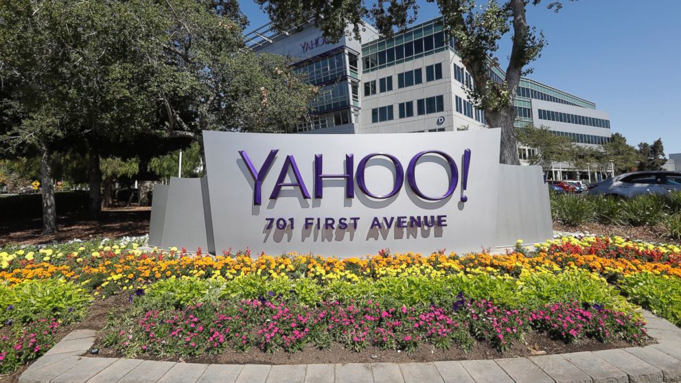 PHOTO: Flowers bloom in front of a Yahoo sign at the company's headquarters, July 19, 2016, in Sunnyvale, California. 