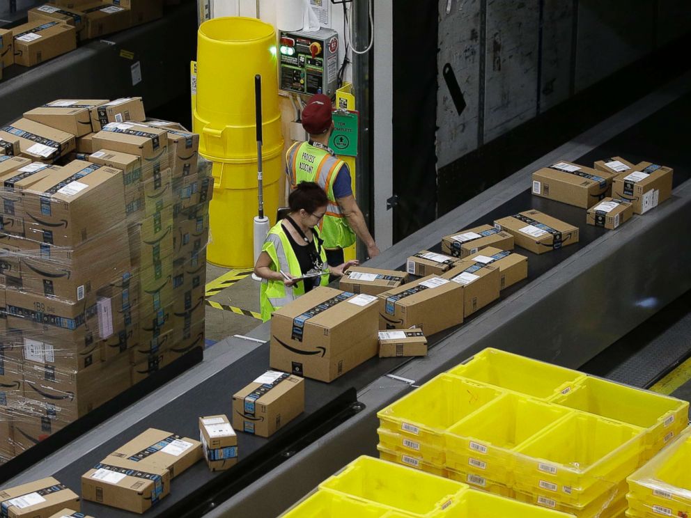 PHOTO: Packages move down a conveyor system to the proper shipping area at the new Amazon Fulfillment Center in Sacramento, Calif. on Feb. 9, 2018.