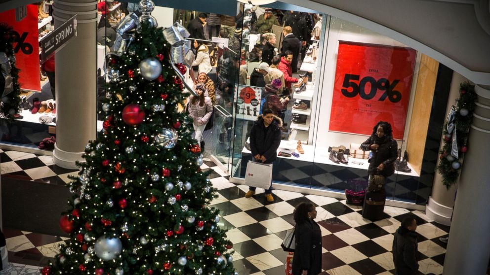 People shop on the day after Thanksgiving, called Black Friday, in Manhattan Mall on Nov. 28, 2014 in New York City.