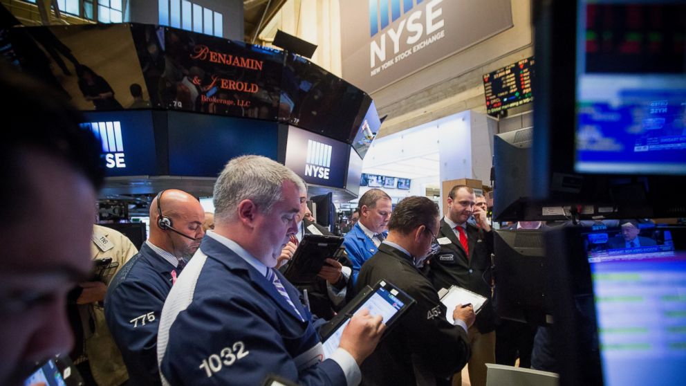 Traders work on the floor of the New York Stock Exchange (NYSE) on April 18, 2016, in New York City.