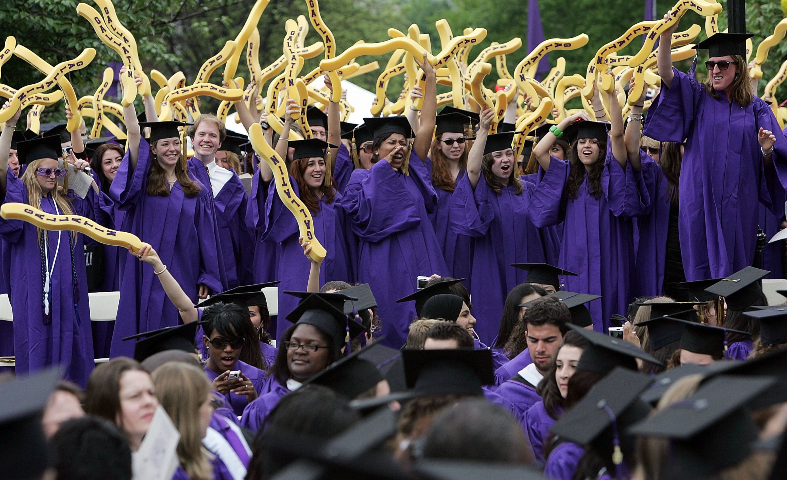 PHOTO: New York University graduates celebrate during commencement ceremonies in Washington Square Park on May 10, 2007 in New York City. 