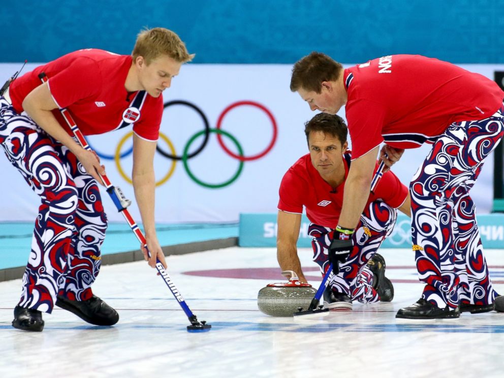 PHOTO: Jaavard Vad Petersson, Thomas Ulsrud and Christoffer Svae of Norway compete against Denmark during the Mens Curling Round Robin on Feb. 17, 2014.