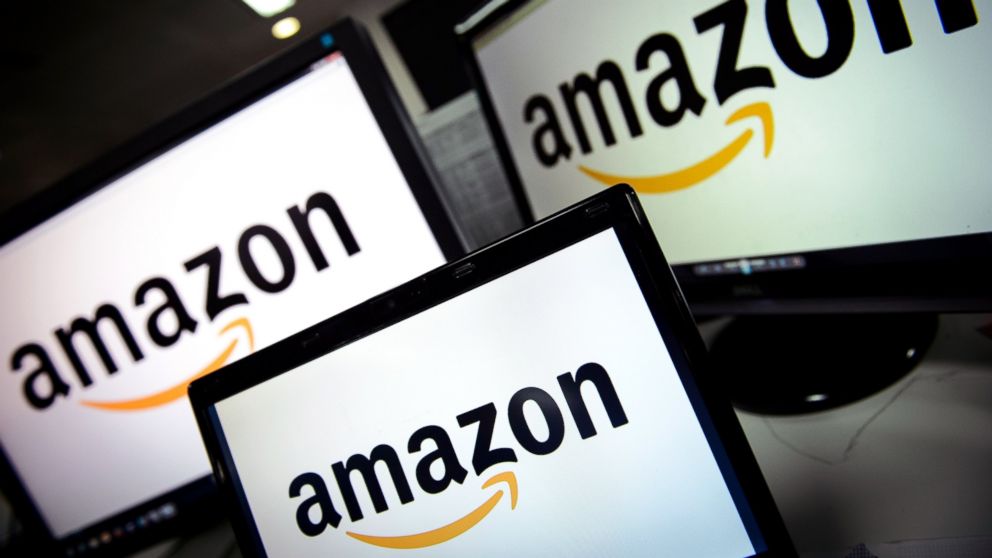 A picture shows the logo of the online retailer Amazon dispalyed on computer screens in London, Dec. 11, 2014.