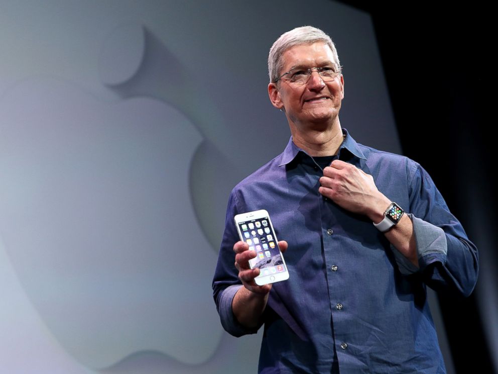 PHOTO: Apple CEO Tim Cook shows off the new iPhone 6 and the Apple Watch during an Apple special event at the Flint Center for the Performing Arts, Sept. 9, 2014, in Cupertino, Calif.