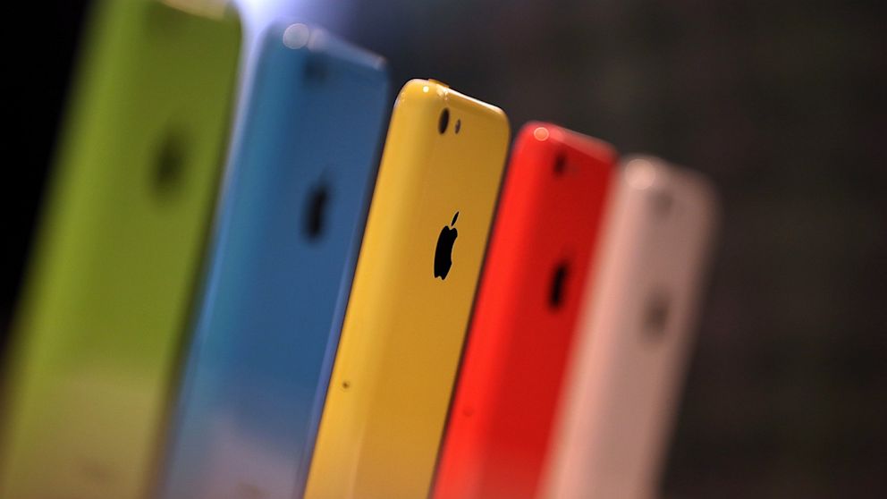 The new iPhone 5C is displayed during an Apple product announcement at the Apple campus, Sept. 10, 2013, in Cupertino, Calif. 
