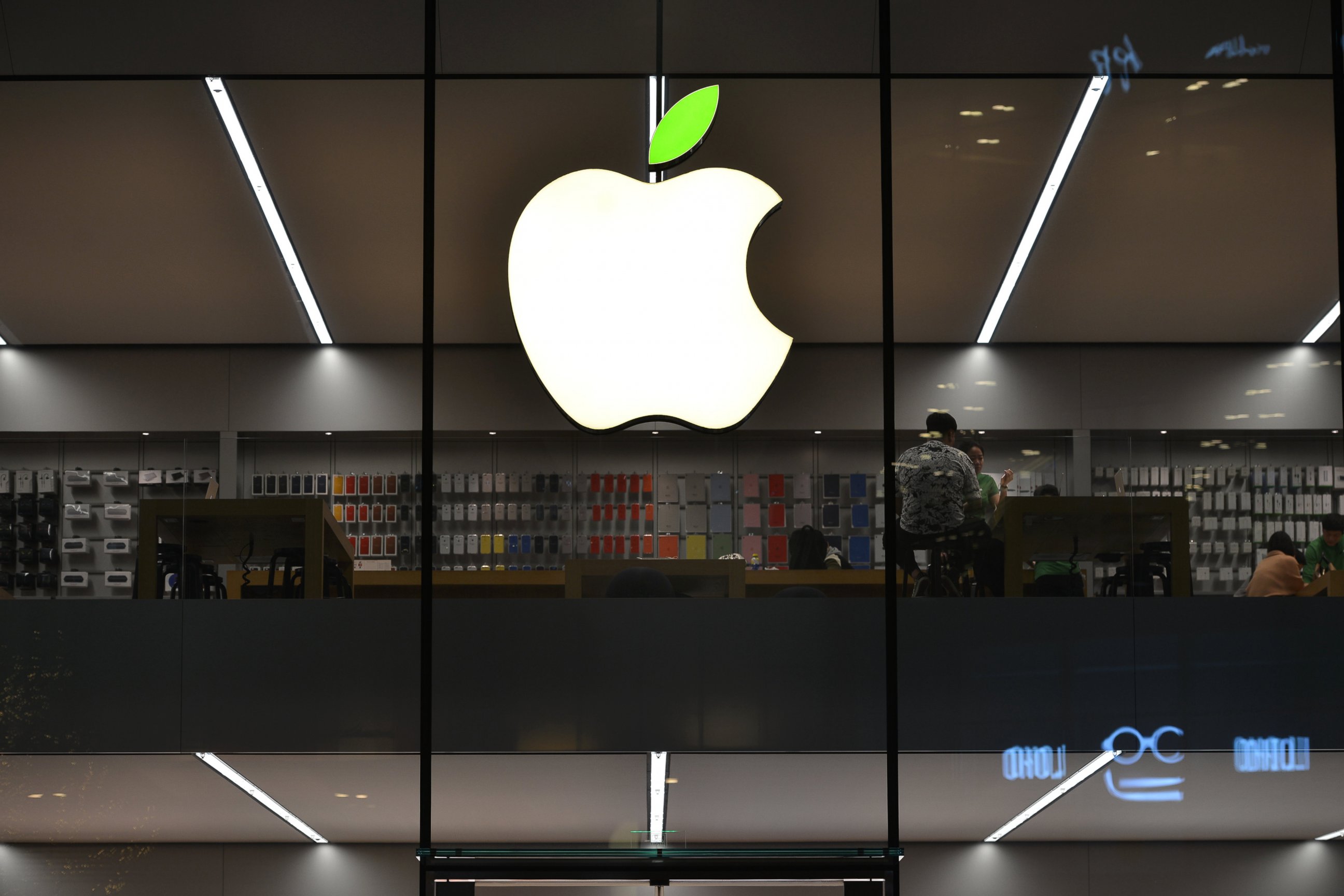 PHOTO: The "leaf" on the logo of Apple store turns green to welcome the World Earth Day on April 20, 2016 in Shenyang, Liaoning Province of China.