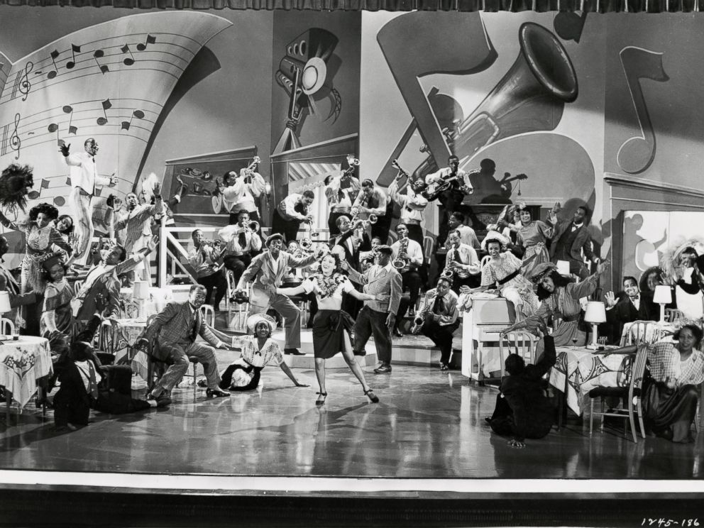 PHOTO: Publicity still of Dorothy Dandridge, Buck and Bubbles and Louis Armstrong on stage in the film "Atlantic City," 1944