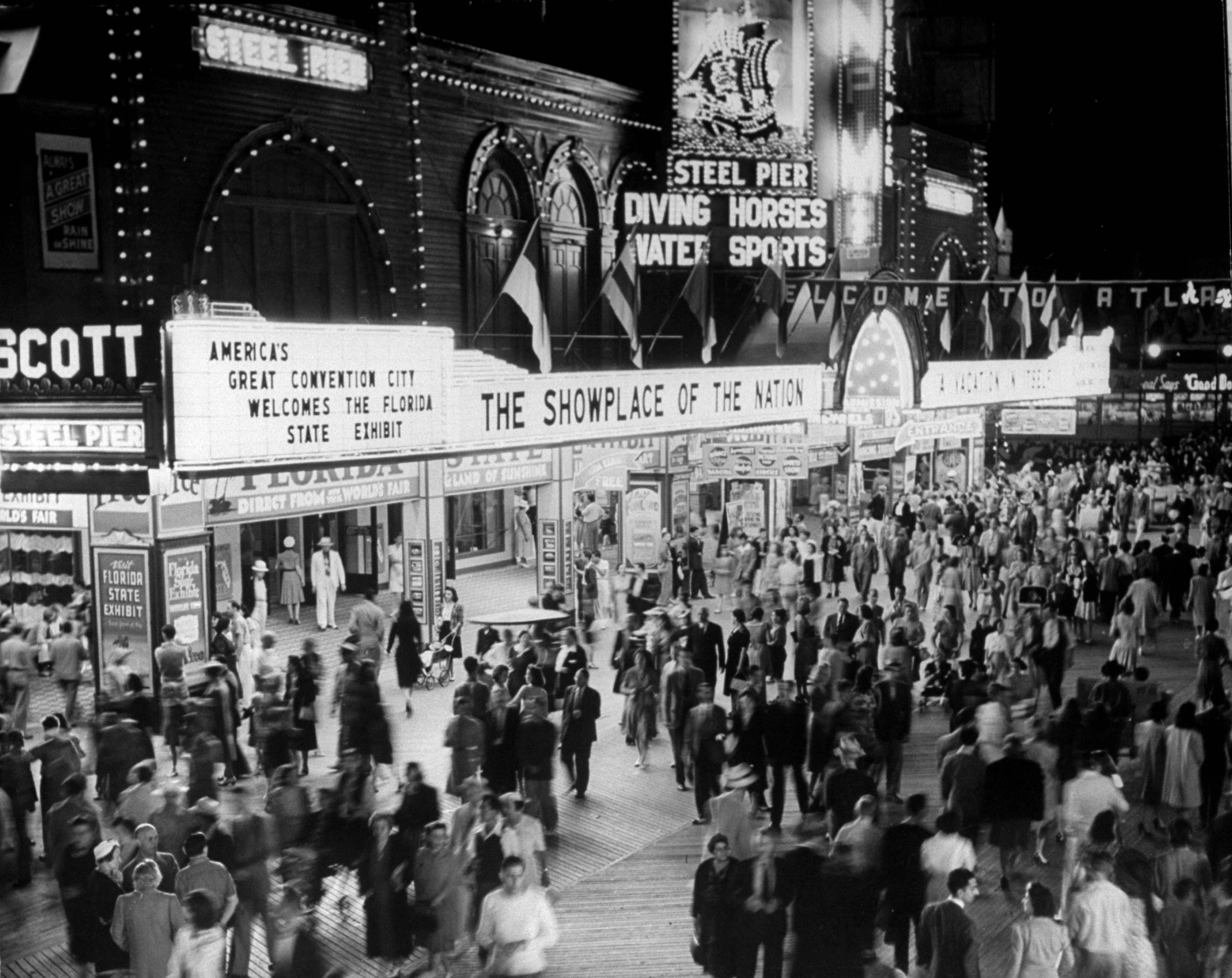 PHOTO: Nightime view of crowds gathering outside the Steel Pier in Atlantic City, N.J., July 1, 1941.