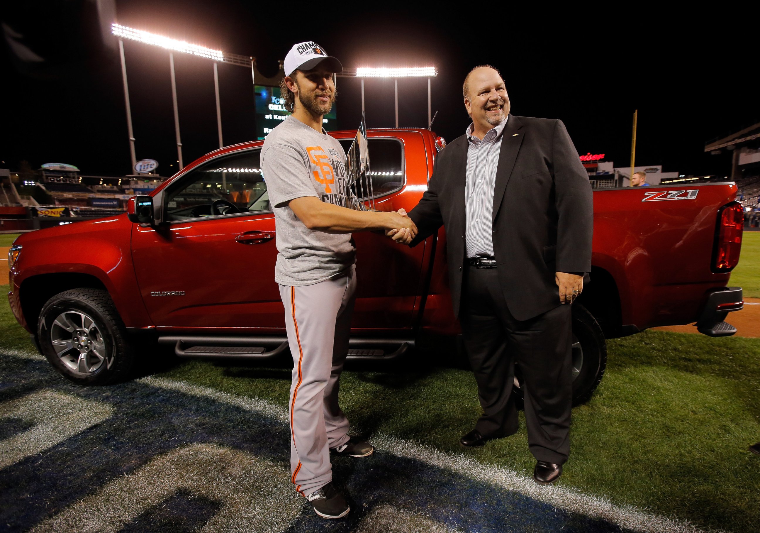 PHOTO: Madison Bumgarner holds the MVP trophy following a 3-2 victory over the Kansas City Royals in Game Seven of the 2014 World Series at Kauffman Stadium, Oct. 29, 2014 in Kansas City, Mo.