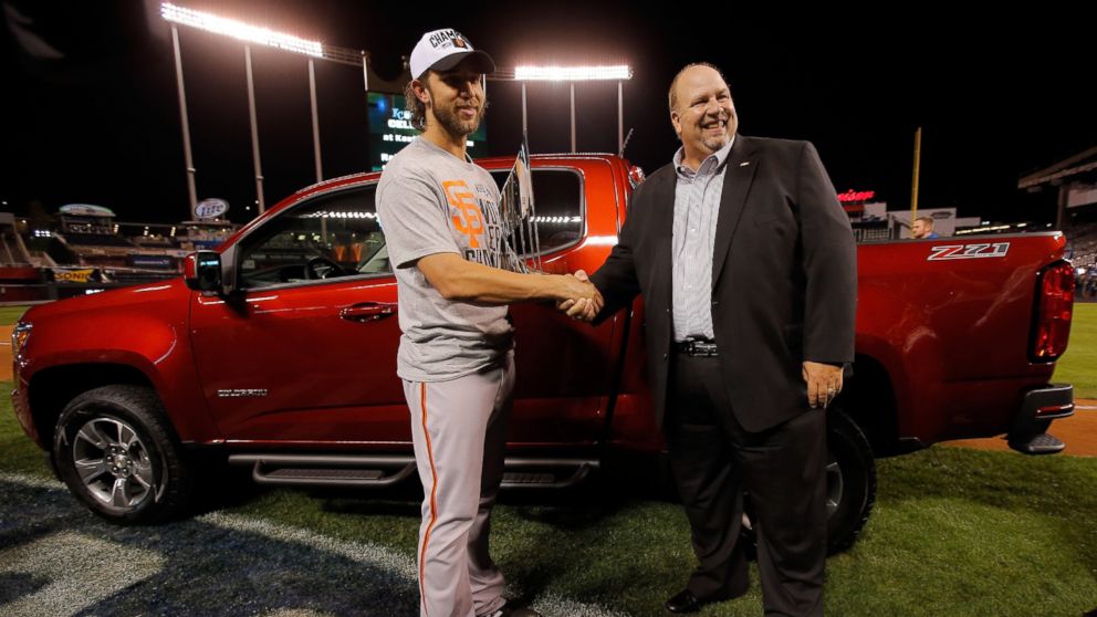 Madison Bumgarner, #40 of the San Francisco Giants, holds the MVP trophy following a 3-2 victory over the Kansas City Royals in Game Seven of the 2014 World Series at Kauffman Stadium, Oct. 29, 2014 in Kansas City, Mo.