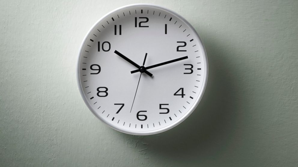 A clock is pictured in this stock image. 