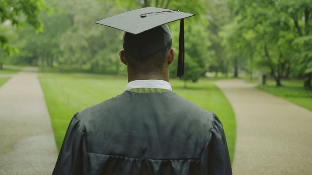 A college graduate is pictured in this stock photo. 