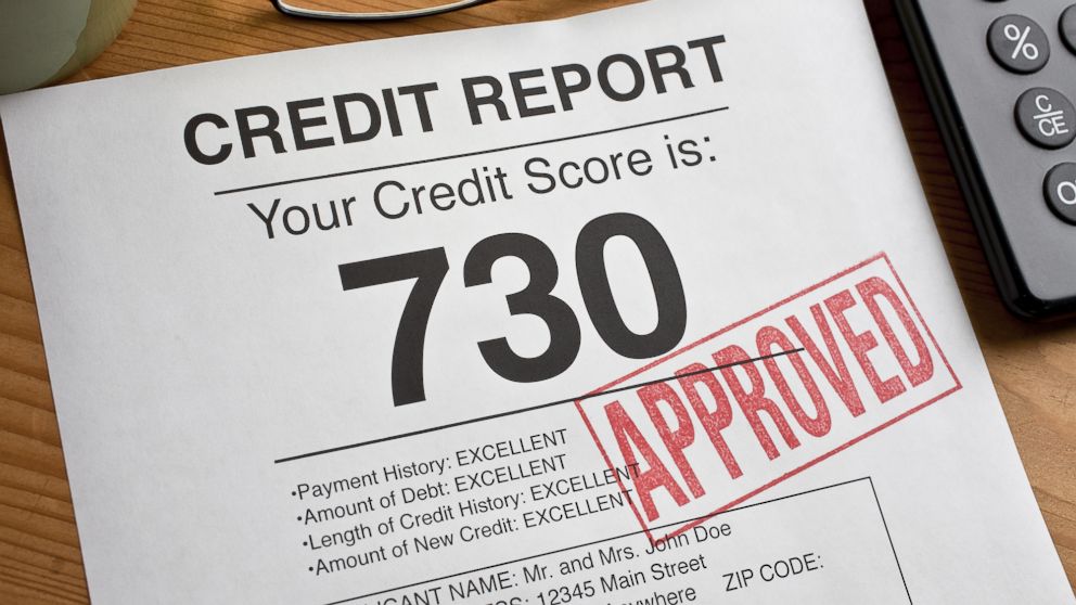 Approve is rubber stamped on a credit report with a high score.