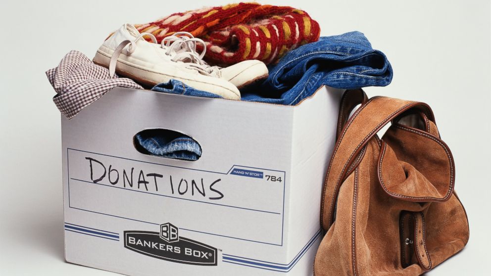 A donations box with clothing is pictured in this stock image. 