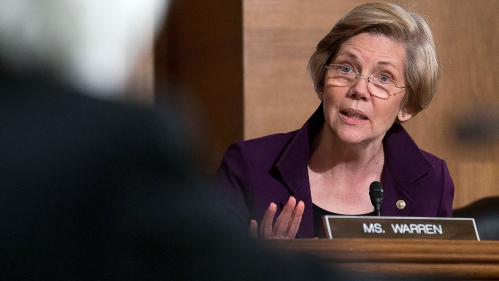 Sen. Elizabeth Warren questions Janet Yellen, chair of the U.S. Federal Reserve, during a Senate Banking Committee hearing in Washington, Feb. 27, 2014.