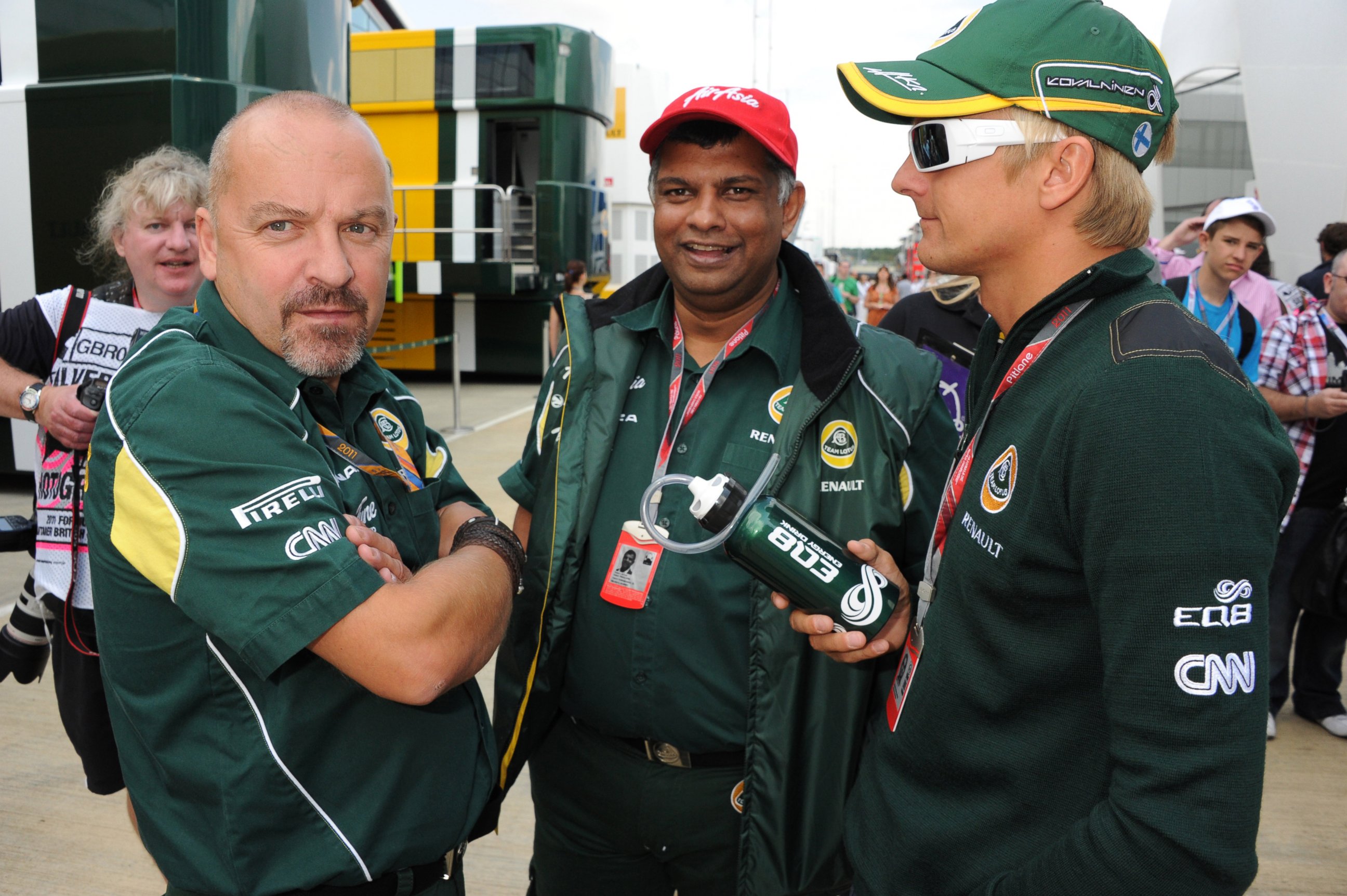 PHOTO: Mike Gascoyne, Tony Fernandes and Heikki Kovalainen at the British Formula One Grand Prix at the Silverstone Circuit on July 10, 2011 in Northampton, England. 