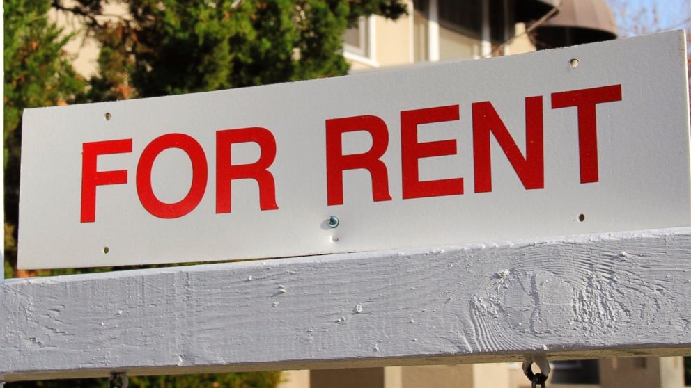 A rent sign is pictured in this stock image.