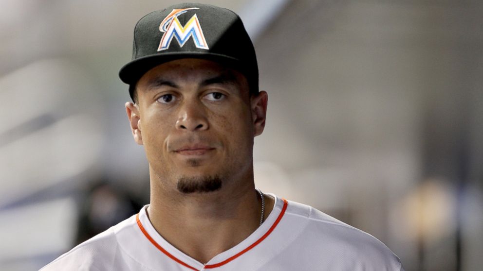 Giancarlo Stanton #27 of the Miami Marlins watches play against the Atlanta Braves at Marlins Park, Sept. 5, 2014 in Miami.