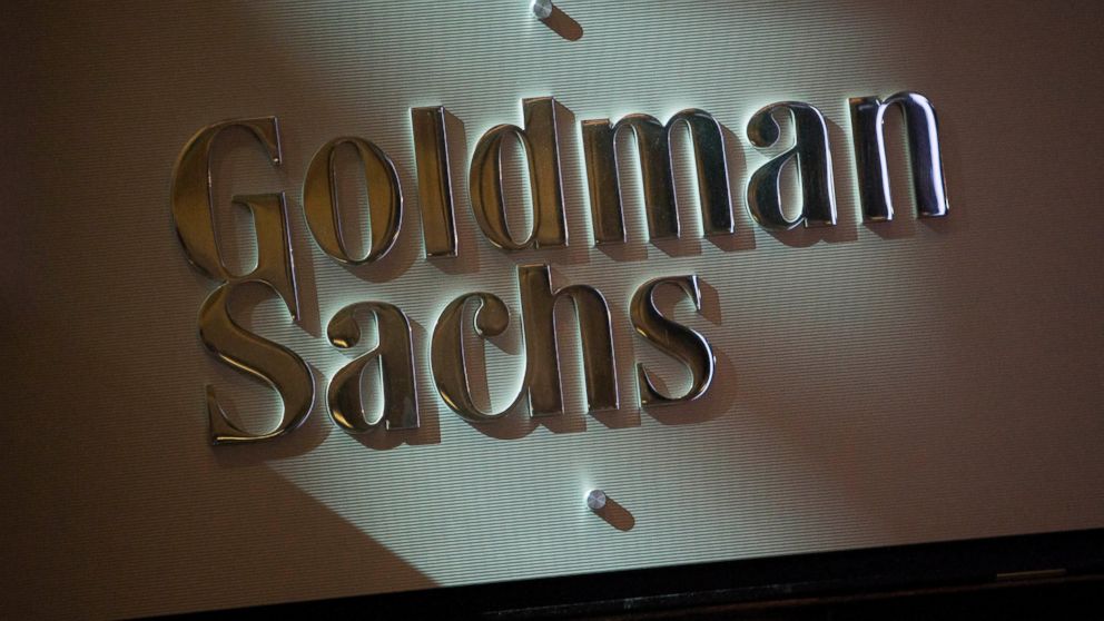 The Goldman Sachs logo is displayed at the company's booth on the floor of the New York Stock Exchange in New York City on July 19, 2013. 