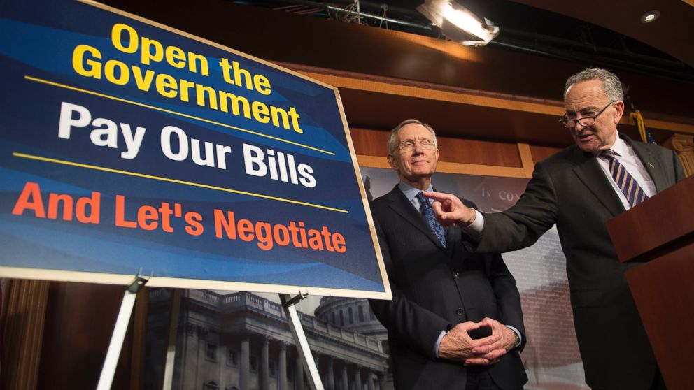 Harry Reid and Chuck Schumer are seen during a news conference on Capitol Hill about the debt ceiling in Washington, Oct. 12, 2013.