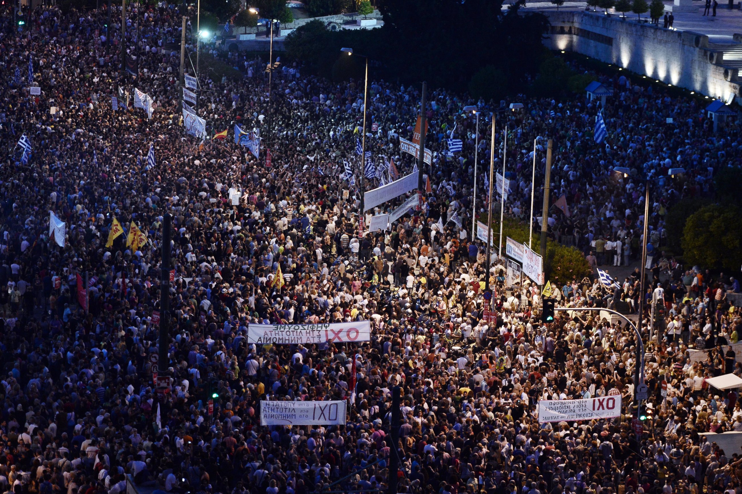 PHOTO: Carrying banners calling for a "NO" vote in the forthcoming referendum on bailout conditions set by the country's creditors, protesters gather in front of the Greek parliament in Athens on June 29, 2015.  