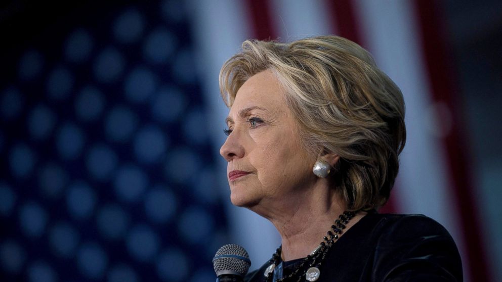 Democratic presidential nominee Hillary Clinton pauses while speaking during a rally at the Palace of Agriculture at the state fairgrounds, Oct. 12, 2016, in Pueblo, Colorado.