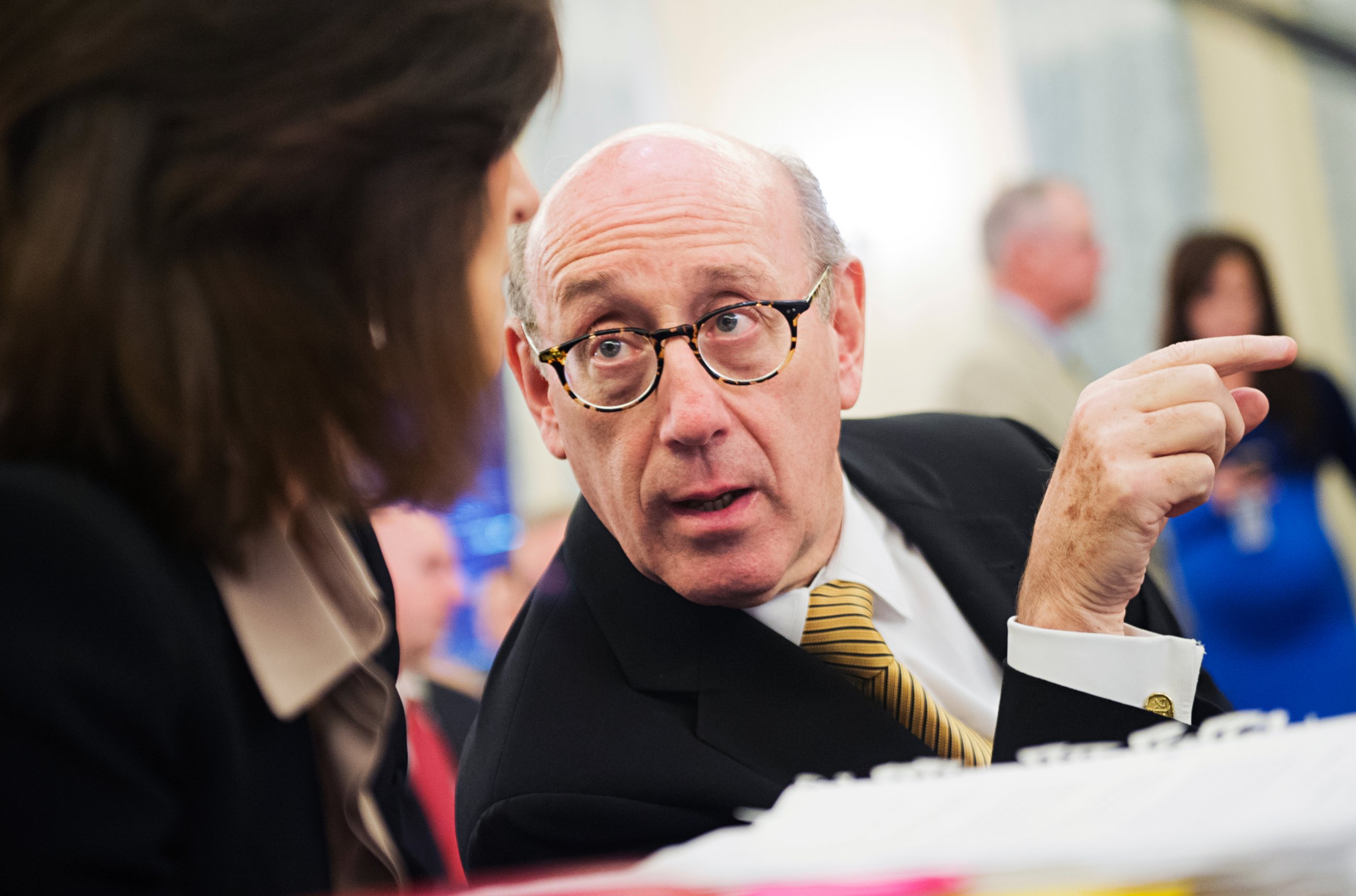 PHOTO: Ken Feinberg talks with colleague Camille Biros in Washington, July 17, 2014.