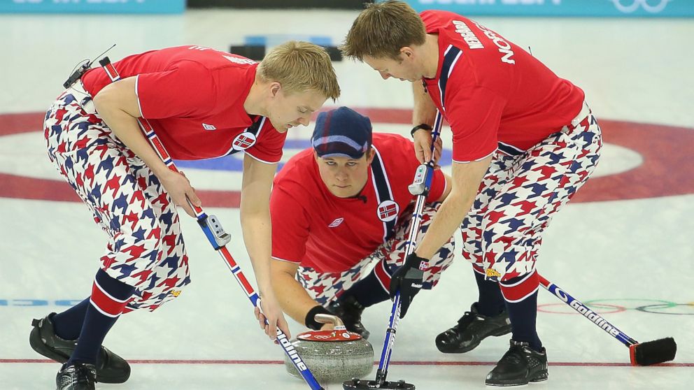 PHOTO: Haavard Vad Petersson, Christoffer Svae and Torger Nergaard of Norway compete in the curling men's round robin match between Norway and Germany during day five of the Sochi 2014 Winter Olympics, Feb. 12, 2014, in Sochi, Russia.  