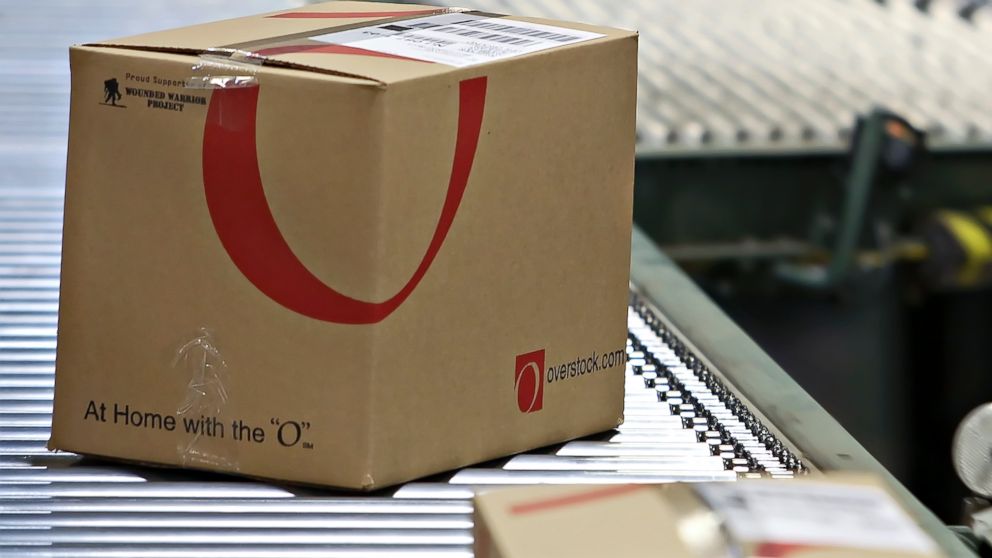 Boxes move down a conveyor belt before being shipped from an Overstock.com warehouse in Salt Lake City, Utah, April 29, 2010.   